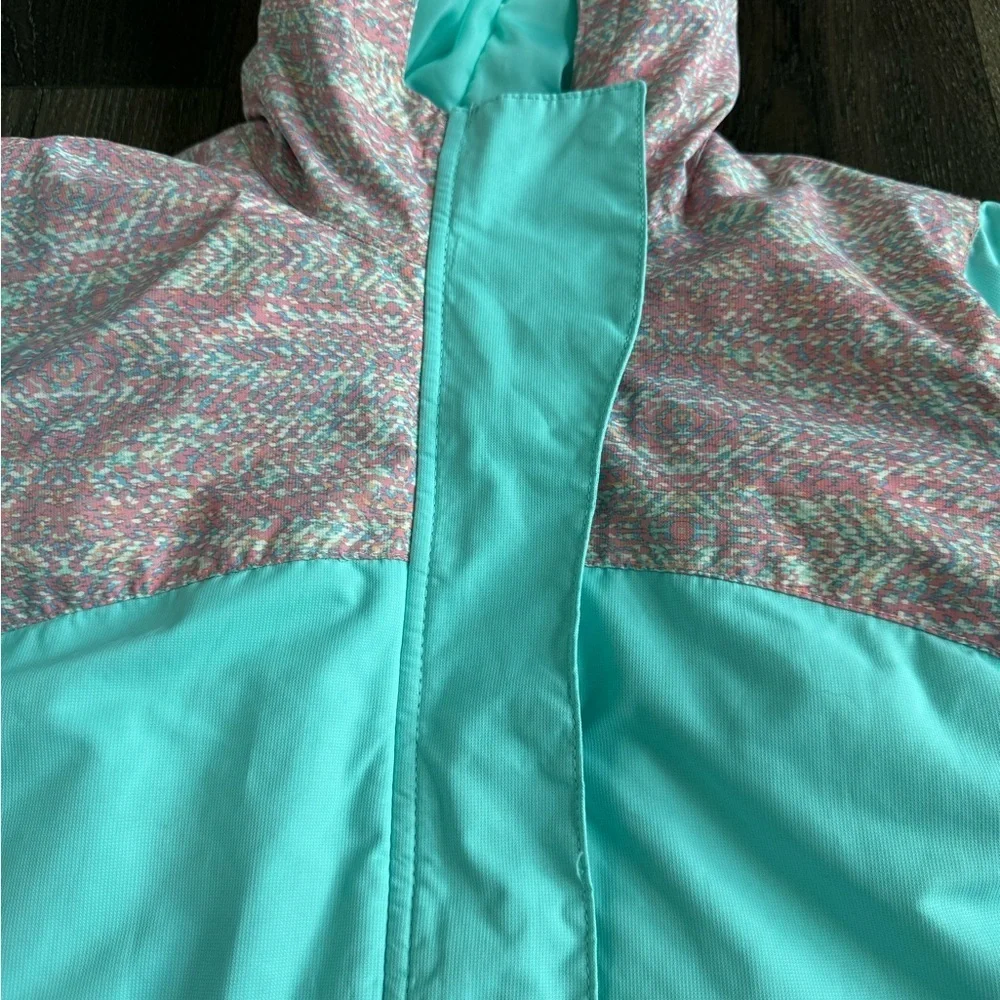 Arctix Winter Coat.  Girls size large.  Teal with pink details.